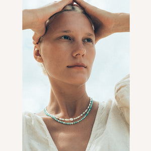 C.W. James Harmony pearl and gemstone necklace and Elodie amazonite necklace on model