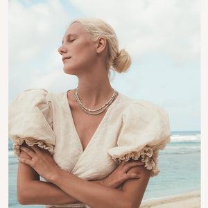 C.W. James Harmony pearl and gemstone necklace and Elodie amazonite necklace on model